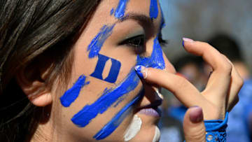 DURHAM, NORTH CAROLINA - MARCH 07: Members of the Cameron Crazies paint themselves blue and white in Krzyzewskiville before the game between the Duke athletics team and the North Carolina Tar Heels at Cameron Indoor Stadium on March 07, 2020 in Durham, North Carolina. (Photo by Grant Halverson/Getty Images)