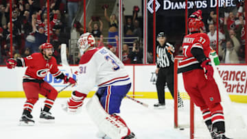 RALEIGH, NC - MARCH 24: Carolina Hurricanes Left Wing Andrei Svechnikov (37) celebrates after scoring the game winning goal in overtime on Montreal Canadiens Goalie Carey Price (31) during a game between the Montreal Canadiens at the Carolina Hurricanes at the PNC Arena in Raleigh, NC on March 24, 2019. (Photo by Greg Thompson/Icon Sportswire via Getty Images)