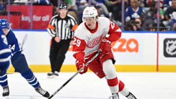 Oct 5, 2023; Toronto, Ontario, CAN; Detroit Red Wings forward Nate Danielson (29) skates with the puck against the Toronto Maple Leafs in the second period at Scotiabank Arena. Mandatory Credit: Dan Hamilton-USA TODAY Sports
