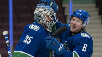 Mar 13, 2021; Vancouver, British Columbia, CAN; Vancouver Canucks goalie Thatcher Demko (35) and forward Brock Boeser (6) celebrate the Canucks victory over the Edmonton Oilers at Rogers Arena. Mandatory Credit: Bob Frid-USA TODAY Sports