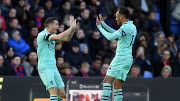 LONDON, ENGLAND - OCTOBER 28: Granit Xhaka of Arsenal (L) celebrates scoring his side's first goal with Pierre-Emerick Aubameyang of Arsenal during the Premier League match between Crystal Palace and Arsenal FC at Selhurst Park on October 28, 2018 in London, United Kingdom. (Photo by Mike Hewitt/Getty Images)