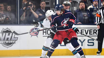 COLUMBUS, OH - FEBRUARY 23: Artemi Panarin #9 of the Columbus Blue Jackets and Erik Karlsson #65 of the San Jose Sharks battle for position as they skate after a loose puck during the second period of a game on February 23, 2019 at Nationwide Arena in Columbus, Ohio. (Photo by Jamie Sabau/NHLI via Getty Images)