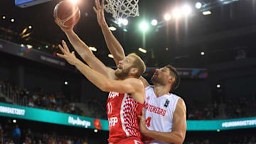 Nikola Vucevic (R) of Montenegro vies with Luka Zoric (L) of Croatia during Group C of the FIBA Eurobasket 2017 mens basketball match between Montenegro and Croatia in Cluj Napoca city September 4, 2017. / AFP PHOTO / Daniel MIHAILESCU (Photo credit should read DANIEL MIHAILESCU/AFP/Getty Images)