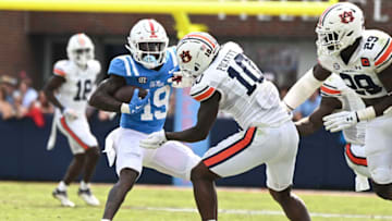 Auburn footballOct 15, 2022; Oxford, Mississippi, USA; Mississippi Rebels wide receiver Dayton Wade (19) runs the ball while defended by Auburn Tigers safety Zion Puckett (10) during the fourth quarter at Vaught-Hemingway Stadium. Mandatory Credit: Matt Bush-USA TODAY Sports