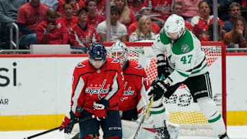WASHINGTON, DC - OCTOBER 08: Nick Jensen #3 of the Washington Capitals blocks a shot in front of Braden Holtby #70 in the third period against the Dallas Stars at Capital One Arena on October 8, 2019 in Washington, DC. (Photo by Patrick McDermott/NHLI via Getty Images)