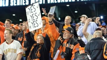 Oct 29, 2014; Kansas City, MO, USA; San Francisco Giants fans celebrate after game seven of the 2014 World Series against the Kansas City Royals at Kauffman Stadium. Mandatory Credit: Peter G. Aiken-USA TODAY Sports