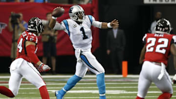 Oct 2, 2016; Atlanta, GA, USA; Carolina Panthers quarterback Cam Newton (1) attempts a pass against Atlanta Falcons outside linebacker Vic Beasley (44) and strong safety Keanu Neal (22) in the third quarter of their game at the Georgia Dome. The Falcons won 48-33. Mandatory Credit: Jason Getz-USA TODAY Sports
