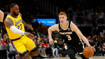 ATLANTA, GEORGIA - DECEMBER 15: Kevin Huerter #3 of the Atlanta Hawks against LeBron James #23 of the Los Angeles Lakers at State Farm Arena on December 15, 2019 in Atlanta, Georgia. NOTE TO USER: User expressly acknowledges and agrees that, by downloading and/or using this photograph, user is consenting to the terms and conditions of the Getty Images License Agreement. (Photo by Kevin C. Cox/Getty Images)