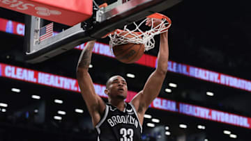 Apr 22, 2023; Brooklyn, New York, USA; Brooklyn Nets center Nic Claxton (33) dunks against the Philadelphia 76ers during the second half of game four of the 2023 NBA playoffs at Barclays Center. Mandatory Credit: Vincent Carchietta-USA TODAY Sports
