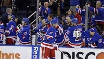Mar 27, 2016; New York, NY, USA; New York Rangers center Eric Staal (12) celebrates scoring a goal with teammate and brother Marc Staal (18) against the Pittsburgh Penguins during the first period at Madison Square Garden. Mandatory Credit: Adam Hunger-USA TODAY Sports