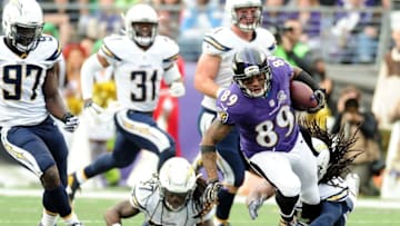 Nov 1, 2015; Baltimore, MD, USA; Baltimore Ravens wide receiver Steve Smith, Sr. (89) is injured while being tackled by San Diego Chargers cornerback Jason Verrett (22) in the third quarter at M&T Bank Stadium. Mandatory Credit: Evan Habeeb-USA TODAY Sports