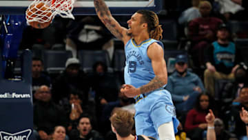 Feb 8, 2022; Memphis, Tennessee, USA; Memphis Grizzlies forward Brandon Clarke (15) dunks during the second half against the Los Angeles Clippers at FedExForum. Petre Thomas-USA TODAY Sports