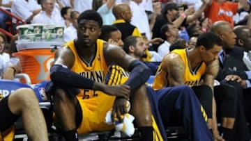 May 30, 2014; Miami, FL, USA; Indiana Pacers center Roy Hibbert (55) reacts from the bench during the second half in game six of the Eastern Conference Finals of the 2014 NBA Playoffs against the Miami Heat at American Airlines Arena. Mandatory Credit: Steve Mitchell-USA TODAY Sports