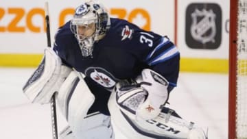 Feb 23, 2016; Winnipeg, Manitoba, CAN; Winnipeg Jets goalie Ondrej Pavelec (31) during the third period against the Dallas Stars at MTS Centre. Dallas wins 5-3. Mandatory Credit: Bruce Fedyck-USA TODAY Sports