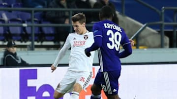 BRUSSELS, BELGIUM - NOVEMBER 29: Edo Kayembe (39) of Anderlecht vies for the ball against Matej Oravec (24) of Spartak Trnava during the UEFA Europa League Group D soccer match between Anderlecht and Spartak Trnava at Constant Van den Stock Stadium in Brussels, Belgium on November 29, 2018. (Photo by Dursun Aydemir/Anadolu Agency/Getty Images)