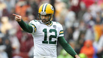 LANDOVER, MD - SEPTEMBER 23: Aaron Rodgers #12 of the Green Bay Packers celebrates after throwing a second quarter touchdown pass against the Washington Redskins at FedExField on September 23, 2018 in Landover, Maryland. (Photo by Rob Carr/Getty Images)