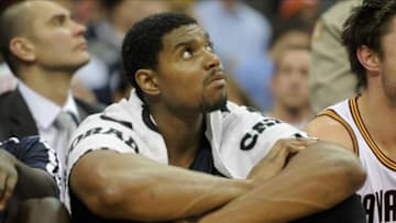Dec 10, 2013; Cleveland, OH, USA; Cleveland Cavaliers center Andrew Bynum sits on the bench during a game against the New York Knicks at Quicken Loans Arena. Cleveland won 109-94. Mandatory Credit: David Richard-USA TODAY Sports