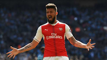 LONDON, ENGLAND - APRIL 23: Olivier Giroud of Arsenal celebrates after his side's first goal by Nacho Monreal (not pictured) during the Emirates FA Cup Semi-Final match between Arsenal and Manchester City at Wembley Stadium on April 23, 2017 in London, England. (Photo by Shaun Botterill/Getty Images,)