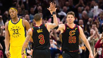 CLEVELAND, OH - APRIL 18: George Hill #3 and Kyle Korver #26 of the Cleveland Cavaliers celebrate after scoring during the final second of the second half as Myles Turner #33 of the Indiana Pacers reacts in Game 2 of the first round of the Eastern Conference playoffs at Quicken Loans Arena on April 18, 2018 in Cleveland, Ohio. The Cavaliers defeated the Pacers 100-97. NOTE TO USER: User expressly acknowledges and agrees that, by downloading and or using this photograph, User is consenting to the terms and conditions of the Getty Images License Agreement. (Photo by Jason Miller/Getty Images)