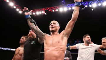 BRASILIA, BRAZIL - MARCH 14: Charles Oliveira of Brazil celebrates after his submission victory over Kevin Lee in their lightweight fight during the UFC Fight Night event on March 14, 2020 in Brasilia, Brazil. (Photo by Buda Mendes/Zuffa LLC)
