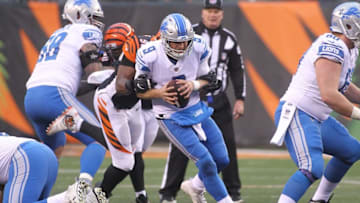 CINCINNATI, OH - DECEMBER 24: Matthew Stafford #9 of the Detroit Lions is sacked by Carlos Dunlap #96 of the Cincinnati Bengals during the second half at Paul Brown Stadium on December 24, 2017 in Cincinnati, Ohio. (Photo by John Grieshop/Getty Images)