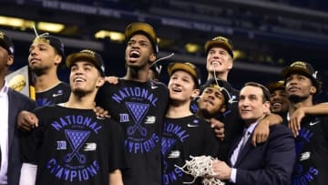 Apr 6, 2015; Indianapolis, IN, USA; Duke Blue Devils head coach Mike Krzyzewski and his players including Quinn Cook watch "One Shining Moment" after defeating the Wisconsin Badgers in the 2015 NCAA Men