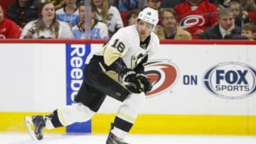 Nov 29, 2014; Raleigh, NC, USA; Pittsburgh Penguins forward Brandon Sutter (16) skates with the puck against the Carolina Hurricanes at PNC Arena. The Penguins won 3-2. Mandatory Credit: James Guillory-USA TODAY Sports