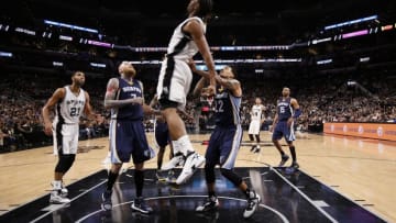 Apr 19, 2016; San Antonio, TX, USA; San Antonio Spurs small forward Kawhi Leonard (2, top) dunks the ball against the Memphis Grizzlies in game two of the first round of the NBA Playoffs at AT&T Center. Mandatory Credit: Soobum Im-USA TODAY Sports