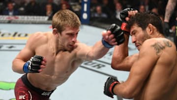 LAS VEGAS, NV - JULY 06: Arnold Allen of England punches Gilbert Melendez in their featherweight fight during the UFC 239 event at T-Mobile Arena on July 6, 2019 in Las Vegas, Nevada. (Photo by Josh Hedges/Zuffa LLC/Zuffa LLC)