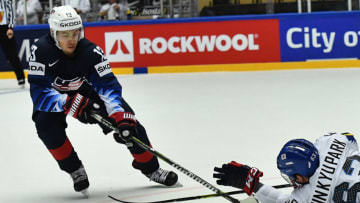 Johnny Gaudreau (L) of the United States challenges for the puck with South Korea's Park Jin-kyu during the group B match the United States vs South Korea of the 2018 IIHF Ice Hockey World Championship at the Jyske Bank Boxen in Herning, Denmark, on May 11, 2018. (Photo by JOE KLAMAR / AFP) (Photo credit should read JOE KLAMAR/AFP/Getty Images)