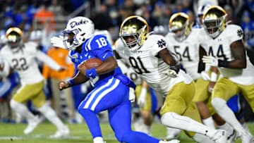 DURHAM, NORTH CAROLINA - NOVEMBER 09: Adetokunbo Ogundeji #91 of the Notre Dame Fighting Irish pressures Quentin Harris #18 of the Duke Blue Devils during the first half of their game at Wallace Wade Stadium on November 09, 2019 in Durham, North Carolina. (Photo by Grant Halverson/Getty Images)