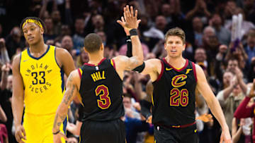 CLEVELAND, OH - APRIL 18: George Hill #3 and Kyle Korver #26 of the Cleveland Cavaliers celebrate after scoring during the final second of the second half as Myles Turner #33 of the Indiana Pacers reacts in Game 2 of the first round of the Eastern Conference playoffs at Quicken Loans Arena on April 18, 2018 in Cleveland, Ohio. The Cavaliers defeated the Pacers 100-97. NOTE TO USER: User expressly acknowledges and agrees that, by downloading and or using this photograph, User is consenting to the terms and conditions of the Getty Images License Agreement. (Photo by Jason Miller/Getty Images)