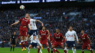 LONDON, ENGLAND - OCTOBER 22: James Milner of Liverpool clears the ball during the Premier League match between Tottenham Hotspur and Liverpool at Wembley Stadium on October 22, 2017 in London, England. (Photo by David Ramos/Getty Images)