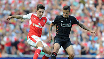 LONDON, ENGLAND - AUGUST 14: Hector Bellerin of Arsenal challenged by Philippe Coutinho of Liverpool during the Premier League match between Arsenal and Liverpool at Emirates Stadium on August 14, 2016 in London, England. (Photo by Stuart MacFarlane/Arsenal FC via Getty Images)