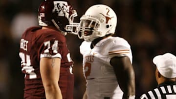 COLLEGE STATION, TX - NOVEMBER 26: Right tackle Lee Grimes #74 of the Texas A&M Aggies confronts defensive end Sergio Kindle #2 of the Texas Longhorns in the first half at Kyle Field on November 26, 2009 in College Station, Texas. The Longhorns defeated the Aggies 49-39. (Photo by Aaron M. Sprecher/Getty Images)