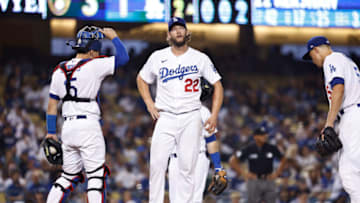 LOS ANGELES, CALIFORNIA - OCTOBER 01: Clayton Kershaw #22 of the Los Angeles Dodgers reacts on the mound prior to exiting the game due to an injury during a game against the Milwaukee Brewers in the second inning at Dodger Stadium on October 01, 2021 in Los Angeles, California. (Photo by Michael Owens/Getty Images)
