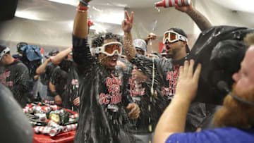 Sep 26, 2016; Detroit, MI, USA; Cleveland Indians celebrate clinching the Central Division title in the clubhouse after the game against the Detroit Tigers at Comerica Park. Indians win 7-4. Mandatory Credit: Raj Mehta-USA TODAY Sports