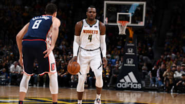 DENVER, CO - FEBRUARY 24: Paul Millsap #4 of the Denver Nuggets handles the ball against the LA Clippers on February 24, 2019 at the Pepsi Center in Denver, Colorado. NOTE TO USER: User expressly acknowledges and agrees that, by downloading and/or using this Photograph, user is consenting to the terms and conditions of the Getty Images License Agreement. Mandatory Copyright Notice: Copyright 2019 NBAE (Photo by Garrett Ellwood/NBAE via Getty Images)
