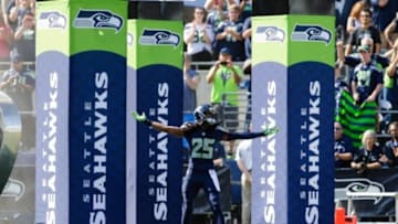 Sep 21, 2014; Seattle, WA, USA; Seattle Seahawks cornerback Richard Sherman (25) enters the field prior to the game against the Denver Broncos at CenturyLink Field. Seattle defeated Denver 26-20. Mandatory Credit: Steven Bisig-USA TODAY Sports