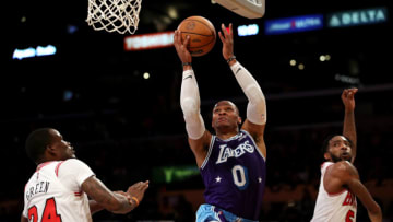 LOS ANGELES, CALIFORNIA - NOVEMBER 15: Russell Westbrook #0 of the Los Angeles Lakers drives to the basket against Javonte Green #24 and Derrick Jones Jr. #5 of the Chicago Bulls during the second quarter at Staples Center on November 15, 2021 in Los Angeles, California. NOTE TO USER: User expressly acknowledges and agrees that, by downloading and or using this photograph, User is consenting to the terms and conditions of the Getty Images License Agreement. (Photo by Katelyn Mulcahy/Getty Images)