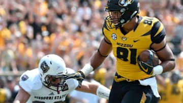COLUMBIA, MO - SEPTEMBER 2: Albert Okwuegbunam #81 of the Missouri Tigers gets past Jared Beshore #30 of the Missouri State Bears as he scores in the third quarter at Memorial Stadium on September 2, 2017 in Columbia, Missouri. (Photo by Ed Zurga/Getty Images)