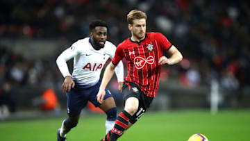 LONDON, ENGLAND - DECEMBER 05: Stuart Armstrong of Southampton battles for possession with Danny Rose of Tottenham Hotspur during the Premier League match between Tottenham Hotspur and Southampton FC at Wembley Stadium on December 5, 2018 in London, United Kingdom. (Photo by Julian Finney/Getty Images)