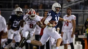 Sean Clifford #14 of the Penn State Nittany Lions scrambles during the second half of the game against the Indiana Hoosiers at Beaver Stadium on October 2, 2021 in State College, Pennsylvania. (Photo by Scott Taetsch/Getty Images)
