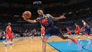 OKLAHOMA CITY, OK - APRIL 9: Terrance Ferguson #23 of the Oklahoma City Thunder grabs the rebound against the Houston Rockets on April 9, 2019 at the Chesapeake Energy Arena in Boston, Massachusetts. NOTE TO USER: User expressly acknowledges and agrees that, by downloading and or using this photograph, User is consenting to the terms and conditions of the Getty Images License Agreement. Mandatory Copyright Notice: Copyright 2019 NBAE (Photo by Zach Beeker/NBAE via Getty Images)