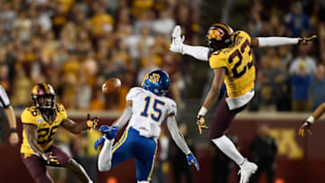 MINNEAPOLIS, MN - AUGUST 29: Jordan Howden #23 of the Minnesota Gophers breaks up a pass intended for Cade Johnson #15 of the South Dakota State Jackrabbits as Justus Harris #26 of the Minnesota Gophers looks on during the fourth quarter of the game on August 29, 2018 at TCF Bank Stadium in Minneapolis, Minnesota. The Gophers defeated the Jackrabbits 28-21. (Photo by Hannah Foslien/Getty Images)