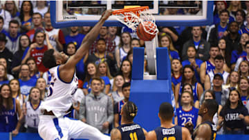 LAWRENCE, KANSAS - NOVEMBER 19: Udoka Azubuike #35 of the Kansas Jayhawks dunks against Jeromy Rodriguez #11, Patrick Good #10 and Bo Hodges #3 of the East Tennessee State Buccaneers during the second half at Allen Fieldhouse on November 19, 2019 in Lawrence, Kansas. (Photo by Ed Zurga/Getty Images)