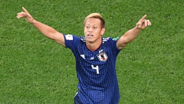 Japan's midfielder Keisuke Honda celebrates after scoring his team's second goal during the Russia 2018 World Cup Group H football match between Japan and Senegal at the Ekaterinburg Arena in Ekaterinburg on June 24, 2018. (Photo by Kirill KUDRYAVTSEV / AFP) / RESTRICTED TO EDITORIAL USE - NO MOBILE PUSH ALERTS/DOWNLOADS (Photo credit should read KIRILL KUDRYAVTSEV/AFP/Getty Images)