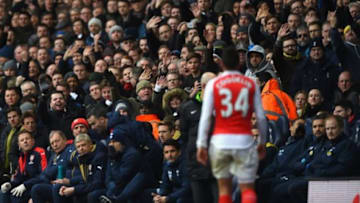 LONDON, ENGLAND - MARCH 05: Arsene Wenger (3rd L) Manager of Arsenal watches Francis Coquelin walking off the pitch after his red card during the Barclays Premier League match between Tottenham Hotspur and Arsenal at White Hart Lane on March 5, 2016 in London, England. (Photo by Shaun Botterill/Getty Images)