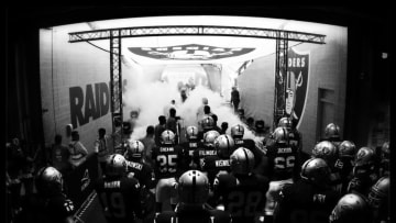 LONDON, ENGLAND - SEPTEMBER 28: (EDITORS NOTE: DIGITAL FILTERS WERE USED IN THE CREATION OF THIS IMAGE) The Raiders take to the field prior to kickoff during the NFL match between the Oakland Raiders and the Miami Dolphins at Wembley Stadium on September 28, 2014 in London, England. (Photo by Richard Heathcote/Getty Images)