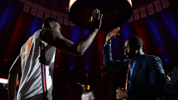 CHAMPAIGN, IL - JANUARY 11: Illinois Fighting Illini graduate assistant Kwa Jones high fives Illinois Fighting Illini center Kofi Cockburn (21) during player introductions before the start of the Big Ten Conference college basketball game between the Rutgers Scarlet Knights and the Illinois Fighting Illini on January 11, 2020, at the State Farm Center in Champaign, Illinois. (Photo by Michael Allio/Icon Sportswire via Getty Images)